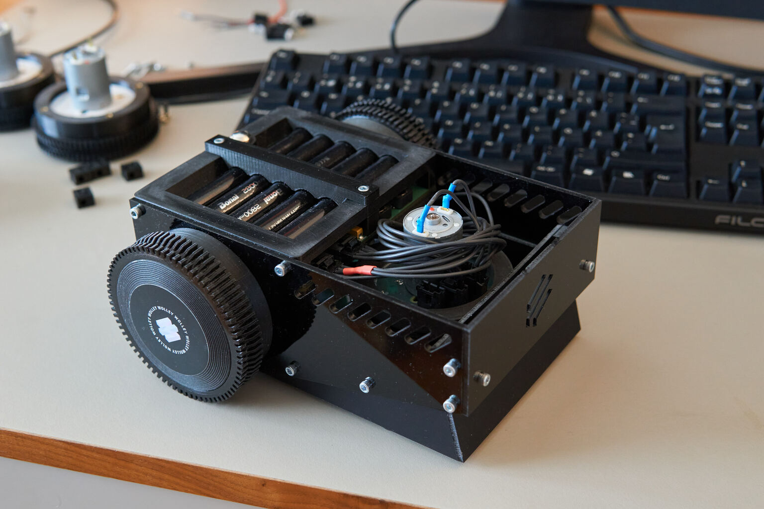A functional, radio controlled prototype. The chassi parts are laser cut from black acrylic sheet.
